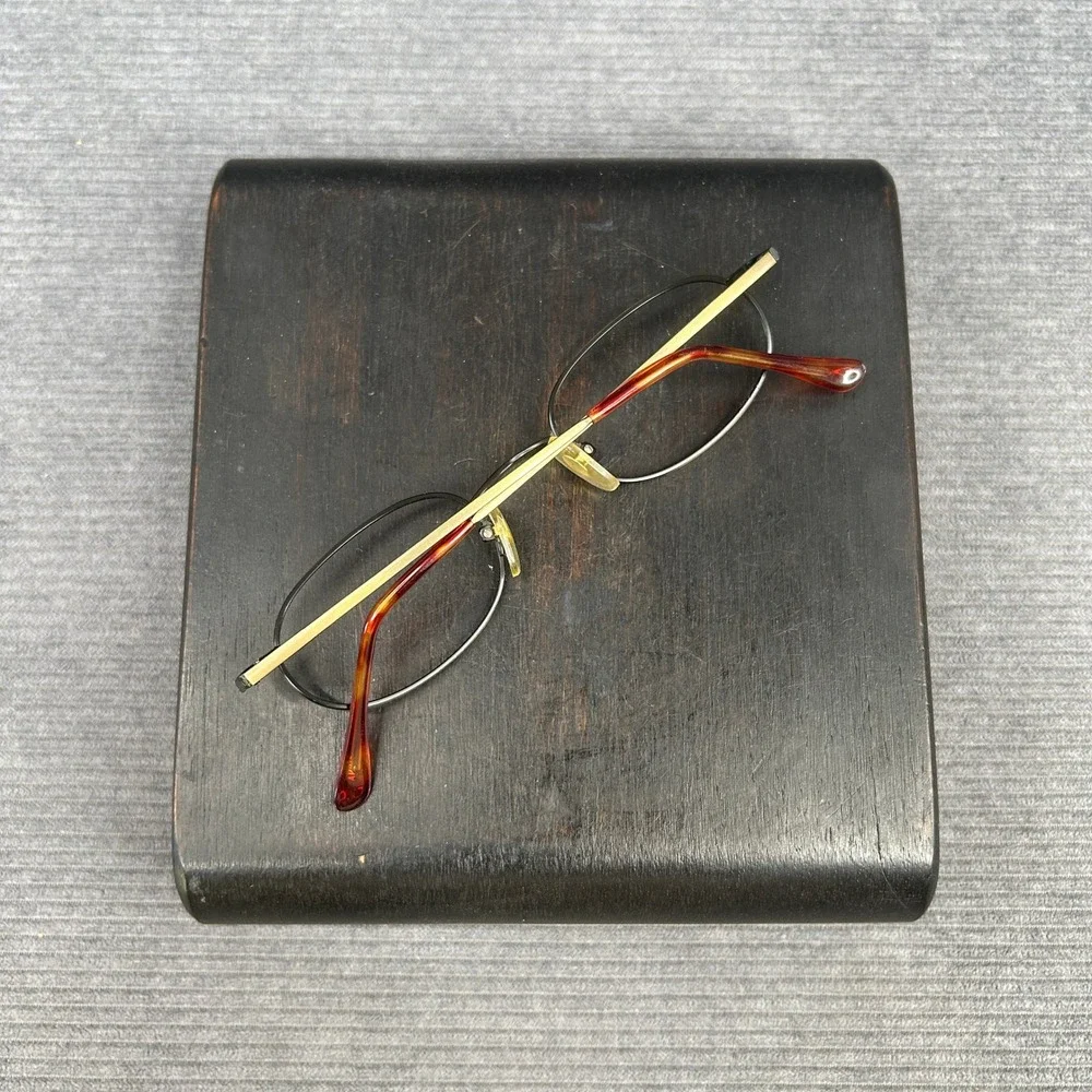 Coast 453 Antique Tortoise Oval Y2k Eyeglasses Frames 47-21-140 Black Gold Metal